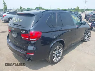 2017 BMW X5 xDrive50i with VIN 5UXKR6C5XH0J84270, listed as a IAAI auction lot 42437301 with 92,847 mi miles and . Bid and sale history available at DreamBid. Image 4.