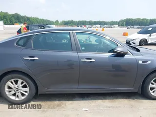 2016 Kia Optima LX with VIN KNAGT4L33G5111199, listed as a IAAI auction lot 42380970 with 97,072 mi miles and . Bid and sale history available at DreamBid. Image 13.