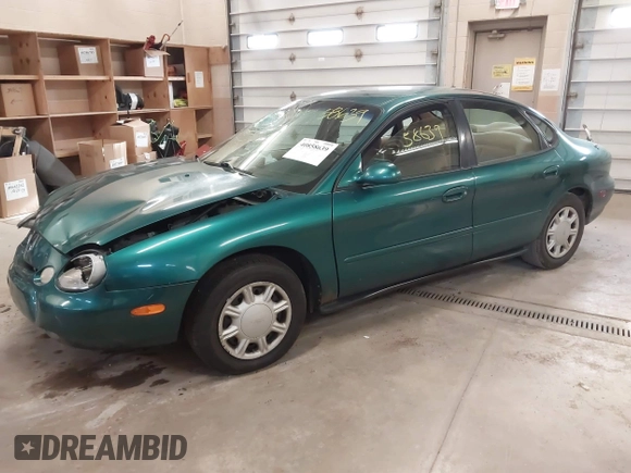 1996 Ford Taurus GL z VIN 1FALP52U5TG110582, wystawiony jako IAAI lot #40858639 z przebiegiem 57 965 mil mil oraz . Historia ofert i sprzedaży dostępna na DreamBid. Obrazek 17.