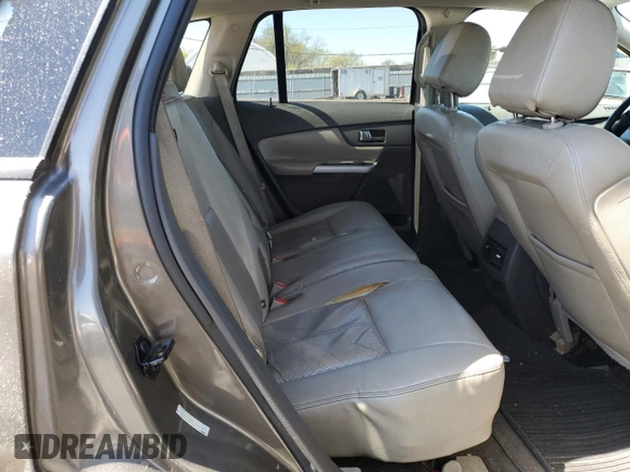 2014 Ford Edge SEL z VIN 2FMDK4JC7EBA36345, wystawiony jako Copart lot #53434145 z przebiegiem 184 955 mil mil oraz Szkoda całkowita • Salvage title. Historia ofert i sprzedaży dostępna na DreamBid. Obrazek 11.
