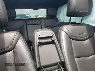 2021 Cadillac XT5 FWD Premium Luxury z VIN 1GYKNCR44MZ106982, wystawiony jako Copart lot #62234455 z przebiegiem 93 079 mil mil oraz Szkoda całkowita • Salvage title. Historia ofert i sprzedaży dostępna na DreamBid. Obrazek 10.