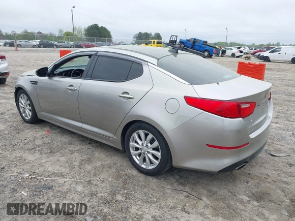 2015 Kia Optima EX with VIN 5XXGN4A76FG409159, listed as a IAAI auction lot 41937814 with 120,641 mi miles. Bid and sale history available at carsss.com. Image 3.