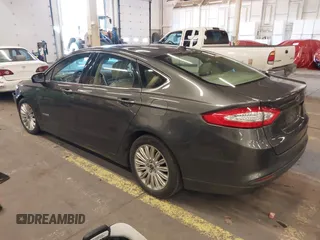 2016 Ford Fusion SE Hybrid with VIN 3FA6P0LU9GR235291, listed as a IAAI auction lot 41560312 with 112,777 mi miles. Bid and sale history available at carsss.com. Image 3.