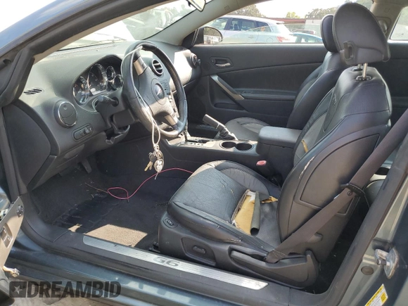 2006 Pontiac G6 GTP with VIN 1G2ZM171964162120, listed as a Copart auction lot 71118824 with 217,234 mi miles and Salvage Title. Bid and sale history available at carsss.com. Image 7.