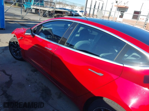 2020 Tesla Model 3 Long Range with VIN 5YJ3E1EB4LF668470, listed as a IAAI auction lot 41743651 with 151,957 mi miles. Bid and sale history available at carsss.com. Image 14.