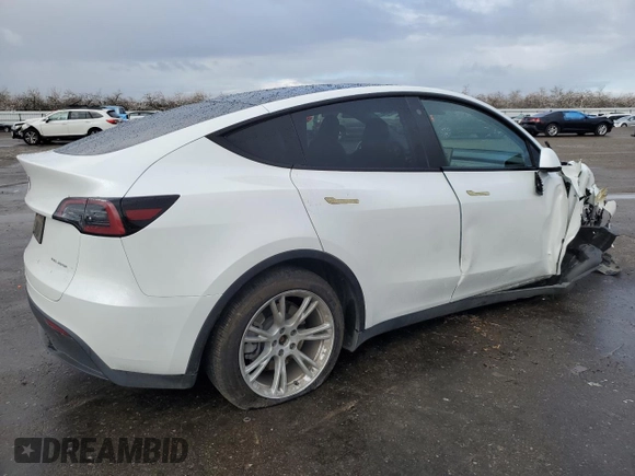 2023 Tesla Model Y Long Range z VIN 7SAYGAEE5PF743079, wystawiony jako Copart lot #45570655 z przebiegiem 46 145 mil mil oraz Szkoda całkowita • Salvage title. Historia ofert i sprzedaży dostępna na DreamBid. Obrazek 3.