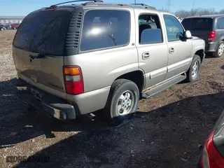 2001 Chevrolet Tahoe LS with VIN 1GNEK13TX1J133931, listed as a IAAI auction lot 41030154 with 234,273 mi miles. Bid and sale history available at carsss.com. Image 4.