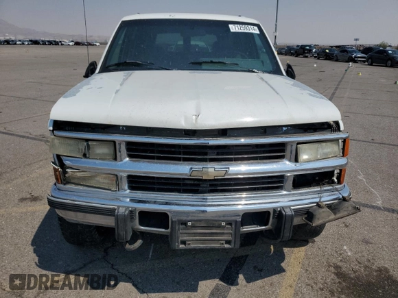 1994 Chevrolet Suburban z VIN 1GNGK26F1RJ444762, wystawiony jako Copart lot #86776674 z przebiegiem 354 375 mil mil oraz Szkoda całkowita • Salvage title. Historia ofert i sprzedaży dostępna na DreamBid. Obrazek 5.