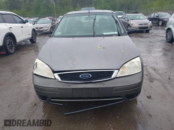 2007 Ford Focus S z VIN 1FAFP34N77W336075, wystawiony jako IAAI lot #42325783 z przebiegiem 153 194 mil mil oraz . Historia ofert i sprzedaży dostępna na DreamBid. Obrazek 12.