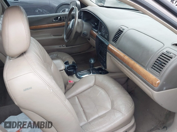 2001 Lincoln Continental with VIN 1LNHM97VX1Y627039, listed as a IAAI auction lot 41482016 with 143,317 mi miles and . Bid and sale history available at DreamBid. Image 5.