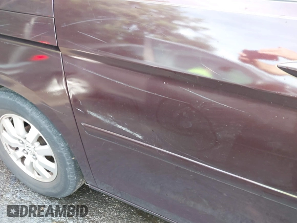 2010 Honda Odyssey EX with VIN 5FNRL3H59AB103405, listed as a IAAI auction lot 42442253 with 129,784 mi miles and . Bid and sale history available at DreamBid. Image 12.
