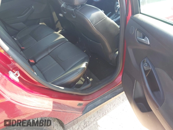 2014 Ford Focus Titanium z VIN 1FADP3N22EL381967, wystawiony jako IAAI lot #42782495 z przebiegiem 160 503 mil mil oraz . Historia ofert i sprzedaży dostępna na DreamBid. Obrazek 8.
