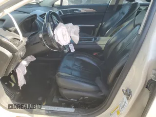 2016 Lincoln MKZ z VIN 3LN6L2G99GR610812, wystawiony jako Copart lot #52916045 z przebiegiem 181 235 mil mil oraz Szkoda całkowita • Salvage title. Historia ofert i sprzedaży dostępna na DreamBid. Obrazek 7.