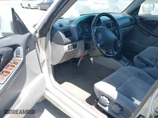 2001 Subaru Forester S w/Premium Pkg with VIN JF1SF65651H757251, listed as a IAAI auction lot 42101284 with 212,856 mi miles. Bid and sale history available at carsss.com. Image 5.