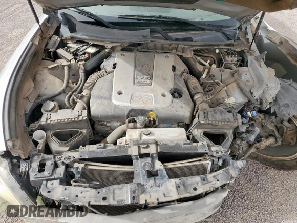 2013 Infiniti M с VIN JN1BY1AP2DM512105, выставлен на аукционе Copart как лот 57183655 с пробегом 159 180 миль миль и Списание • Salvage title. История ставок и продаж доступна на DreamBid. Изображение 11.