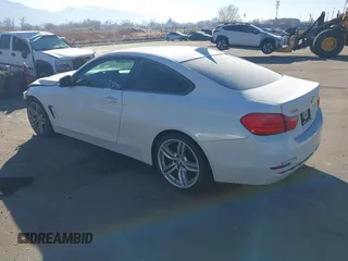2014 BMW 4 Series 435i with VIN WBA3R1C56EK191996, listed as a IAAI auction lot 41450981 with 125,352 mi miles and . Bid and sale history available at carsss.com. Image 3.
