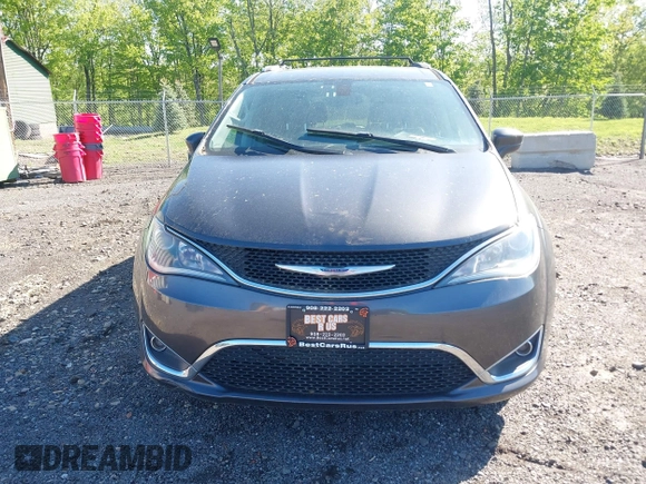 2018 Chrysler Pacifica Touring L with VIN 2C4RC1BG1JR112084, listed as a IAAI auction lot 42206441 with 163,952 mi miles and . Bid and sale history available at DreamBid. Image 12.