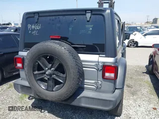 2021 Jeep Wrangler Unlimited Sport Altitude with VIN 1C4HJXDGXMW662493, listed as a IAAI auction lot 41288957 with 64,808 mi miles and . Bid and sale history available at DreamBid. Image 17.