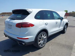 2016 Porsche Cayenne with VIN WP1AA2A22GKA37187, listed as a IAAI auction lot 42406852 with 70,686 mi miles and . Bid and sale history available at DreamBid. Image 4.