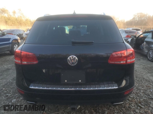 2013 Volkswagen Touareg Lux with VIN WVGEF9BP1DD001025, listed as a Copart auction lot 83784314 with 205,871 mi miles and Salvage Title. Bid and sale history available at DreamBid. Image 6.
