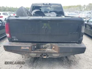 2018 Ram 2500 Laramie with VIN 3C6UR5NLXJG256688, listed as a IAAI auction lot 42168537 with 214,596 mi miles and . Bid and sale history available at DreamBid. Image 16.