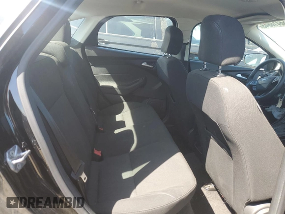2017 Ford Focus SE z VIN 1FADP3F24HL316007, wystawiony jako Copart lot #56416645 z przebiegiem 79 085 mil mil oraz Szkoda całkowita • Salvage title. Historia ofert i sprzedaży dostępna na DreamBid. Obrazek 10.