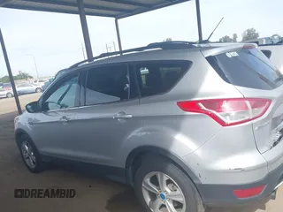 2013 Ford Escape SE with VIN 1FMCU0GX5DUB97293, listed as a IAAI auction lot 42044696 with 182,746 mi miles and . Bid and sale history available at DreamBid. Image 14.