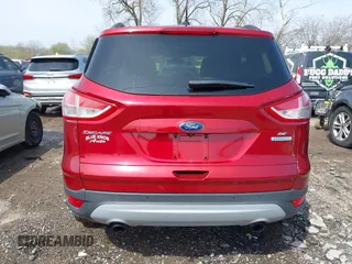 2014 Ford Escape SE with VIN 1FMCU0GX8EUA49818, listed as a IAAI auction lot 41903815 with 100,235 mi miles. Bid and sale history available at carsss.com. Image 16.