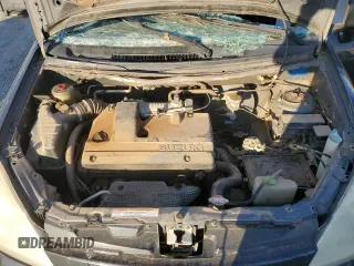 2004 Suzuki Aerio SX z VIN JS2RC61H945252026, wystawiony jako Copart lot #78425004 z przebiegiem 171 601 mil mil oraz Szkoda całkowita • Salvage title. Historia ofert i sprzedaży dostępna na DreamBid. Obrazek 11.