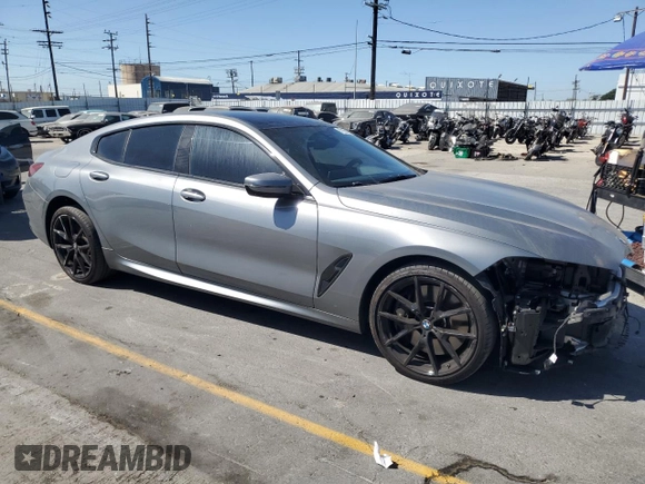 2024 BMW 8 Series 840i with VIN WBAGV2C08RCP97713, listed as a Copart auction lot 57355405 with 14,802 mi miles and Salvage title. Bid and sale history available at DreamBid. Image 4.