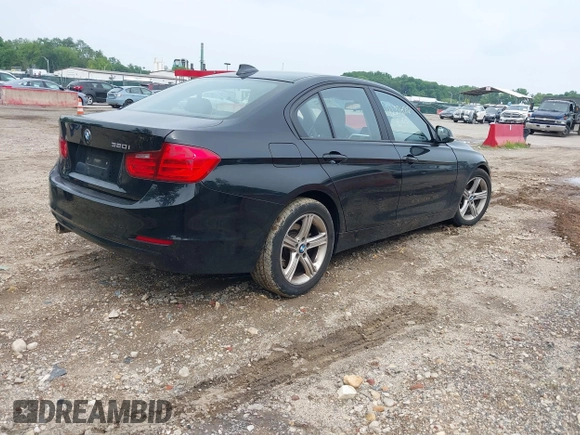 2014 BMW 3 Series 320i with VIN WBA3B1C52EK135610, listed as a IAAI auction lot 42274086 with 69,536 mi miles and . Bid and sale history available at DreamBid. Image 4.