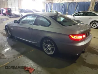 2011 BMW 3 Series 335is with VIN WBAKG1C56BE599457, listed as a Copart auction lot 52412655 with 134,497 mi miles and Clean title. Bid and sale history available at DreamBid. Image 2.
