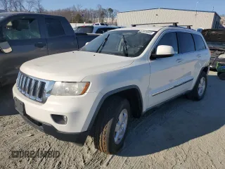 2012 Jeep Grand Cherokee Laredo with VIN 1C4RJFAG0CC201435, listed as a Copart auction lot 47026885 with 205,603 mi miles and Salvage Title. Bid and sale history available at carsss.com. Image 1.