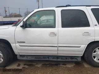 2005 GMC Yukon SLT with VIN 1GKEK13TX5R105664, listed as a IAAI auction lot 41285001 with 494,700 mi miles. Bid and sale history available at carsss.com. Image 14.
