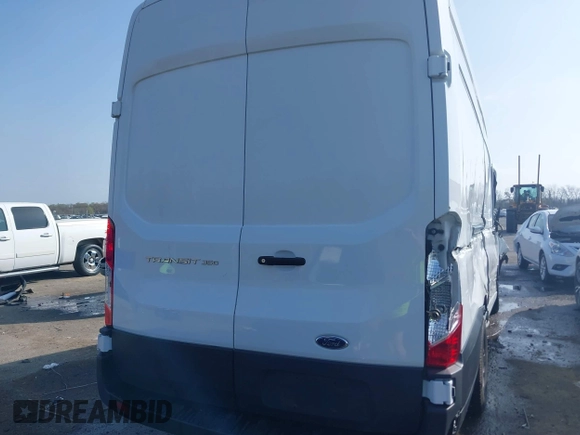 2022 Ford Transit Cargo z VIN 1FTBW3X81NKA04543, wystawiony jako IAAI lot #41763336 z przebiegiem 128 518 mil mil oraz . Historia ofert i sprzedaży dostępna na DreamBid. Obrazek 16.