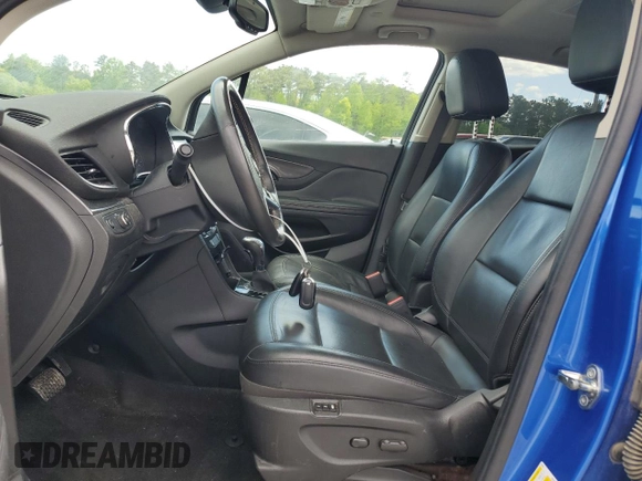 2017 Buick Encore Essence with VIN KL4CJCSB4HB058035, listed as a Copart auction lot 52089365 with 64,194 mi miles and Salvage Title. Bid and sale history available at carsss.com. Image 7.
