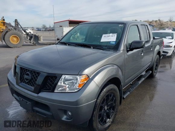 2021 Nissan Frontier SV with VIN 1N6ED0EA6MN722476, listed as a IAAI auction lot 41284313 with 22,476 mi miles and . Bid and sale history available at DreamBid. Image 2.
