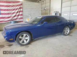 2012 Dodge Challenger SXT Plus with VIN 2C3CDYAG9CH239160, listed as a Copart auction lot 51223635 with 116,546 mi miles and Salvage Title. Bid and sale history available at carsss.com. Image 1.