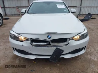 2015 BMW 3 Series 320i with VIN WBA3B1C5XFK140734, listed as a IAAI auction lot 42141319 with 84,863 mi miles and . Bid and sale history available at DreamBid. Image 6.