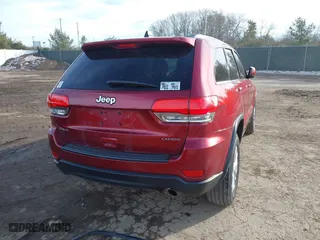 2015 Jeep Grand Cherokee Altitude with VIN 1C4RJFAG4FC626130, listed as a IAAI auction lot 41405767 with 131,069 mi miles. Bid and sale history available at carsss.com. Image 4.