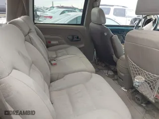 1997 Chevrolet Tahoe with VIN 1GNEK13RXVJ389741, listed as a IAAI auction lot 41518277 with 124,870 mi miles. Bid and sale history available at carsss.com. Image 8.