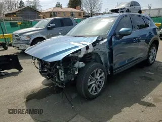 2021 Mazda CX-5 Grand Touring Reserve with VIN JM3KFBAY8M0384498, listed as a Copart auction lot 52013445 with 20,469 mi miles and Salvage Title. Bid and sale history available at carsss.com. Image 11.