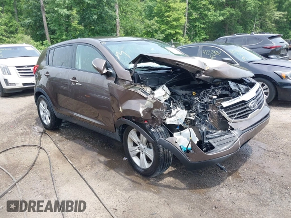 2012 Kia Sportage LX with VIN KNDPB3A20C7290990, listed as a IAAI auction lot 42264420 with 87,994 mi miles and . Bid and sale history available at DreamBid. Image 1.