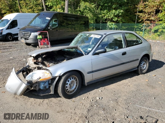 1998 Honda Civic CX with VIN 2HGEJ6427WH121499, listed as a Copart auction lot 73657704 with 101,999 mi miles and Salvage Title. Bid and sale history available at DreamBid. Image 1.
