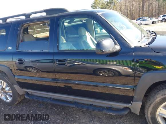 2002 Chevrolet Suburban Z71 with VIN 3GNFK16Z52G264577, listed as a IAAI auction lot 41581984 with 321,321 mi miles. Bid and sale history available at carsss.com. Image 13.