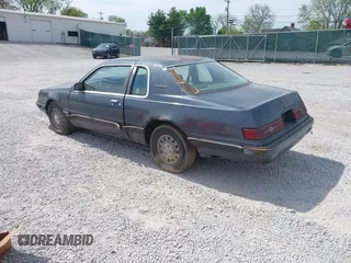 1984 Ford Thunderbird with VIN 1FABP46F1EH236498, listed as a IAAI auction lot 42025335 with 59,589 mi miles and . Bid and sale history available at DreamBid. Image 3.