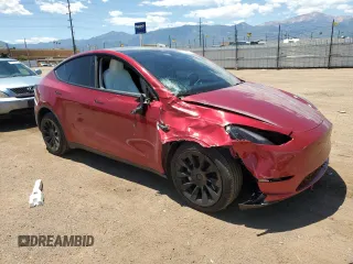 2024 Tesla Model Y Long Range z VIN 7SAYGDEE6RF156183, wystawiony jako Copart lot #61410155 z przebiegiem 27 112 mil mil oraz Szkoda całkowita • Salvage title. Historia ofert i sprzedaży dostępna na DreamBid. Obrazek 4.