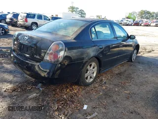2002 Nissan Altima S with VIN 1N4AL11D52C264731, listed as a IAAI auction lot 41242713 with 189,741 mi miles. Bid and sale history available at carsss.com. Image 4.