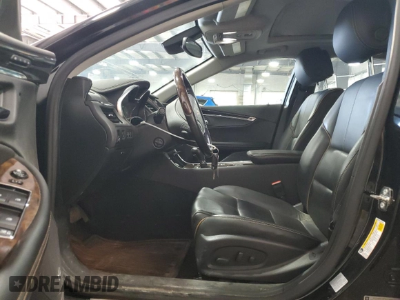 2014 Chevrolet Impala LTZ with VIN 2G1155S31E9275036, listed as a Copart auction lot 52099875 with 87,719 mi miles and Salvage title. Bid and sale history available at DreamBid. Image 7.