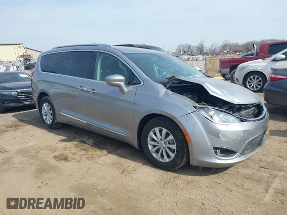 2018 Chrysler Pacifica Touring L with VIN 2C4RC1BG7JR101736, listed as a IAAI auction lot 41776231 with 90,487 mi miles and . Bid and sale history available at DreamBid. Image 1.
